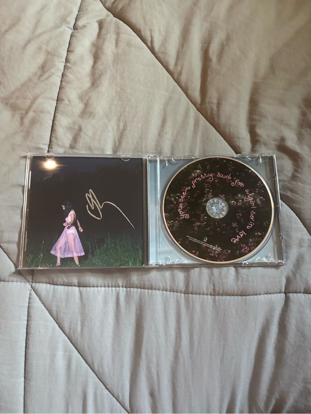 Signed Olivia Rodrigo CD Insert